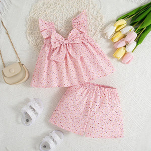 Pink heart print baby girl toddler outfit with a bow.