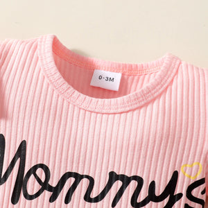 Pink baby romper with 'Mommy's little girl' text and denim skirt.