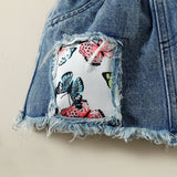 Pink baby romper with 'Mommy's little girl' text and denim skirt.