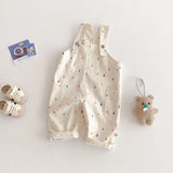 Baby Kids Play suit beige with colorful dots.