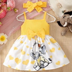 Yellow and white baby girl dress with elephant design.