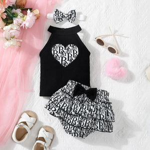 Children's black and white outfit with heart-shaped letters, tops, bloomers and headband.