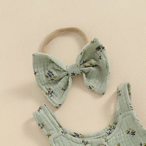 Green baby outfit with floral headband