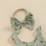 Green baby outfit with floral headband