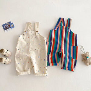 Two baby rompers, one with a dotted pattern and one with colorful stripes