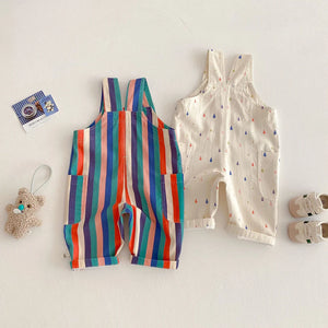 Two baby rompers, one with a dotted pattern and one with colorful stripes